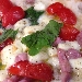 Umberto - Pomodorini del piennolo, provola affumicata di Sorrento, pancetta paesana, pepe di Rimbas, basilico, formaggio, olio EVO