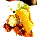 - Cannoli di mare - - Cannoli dolci ripieni di mousse di baccal� black cod su pomodorini confit all'origano. 
