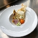 -Bruschetta di riso con belga piastrata, formaggio aromatizzato al lime, patata viola cips e gel�e di pomodoro - -