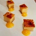 -Confetti di migliaccio caramellati con gel�e d'arancia - -