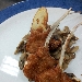 -Costine d'agnello croccanti con prataioli trifolati e patate cips - -