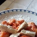 -Gnocchi al sugo 
di carciofi - -