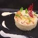 -Risotto mantecato al gorgonzola con carpaccio di gamberi marinati al mojito  - 80 gr Riso Carnaroli,
20 gr di gorgonzola ,
40 gr gamberi,
menta q.b.,
5 ml rhum bianco, 
zucchero di canna q.b.,
lime q.b.
PROC.: il primo passaggio e' pulire i gamberi (mazzancolle) levandogli il carapaceo e le interiora; si incidono sul dorso e con l' aiuto della pellicola si da' un colpetto leggero con il batticarne per schiacciarli; mettere il gambero nella marinatura del mojito.
A parte iniziamo a cuocere il riso (senza alcun fondo di burro, olio e cipolla), mettendolo in una casseruola incandescente e aggiungendo poco per volta il brodo vegetale. Portato a cottura il riso, viene mantecato con il gorgonzola. Adesso viene la parte piu' divertente nel comporre il piatto esteticamente, mettere il riso in un coppapasta e lasciarlo per 10 secondi, il tempo necessario per farlo rassodare, poi proseguiamo con l' aggiungere il carpaccio di gamberi, poi una quenelle di gorgonzola ed infine la mentuccia come ultimo elemento decorativo 