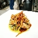-Spalla di Agnello farcita con Carciofi e Provola 

su  Scarola con Uvetta, Pinoli e Croccante di Patate 
 - -
