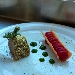 -Trancio di maiale con crosta aromatizzata alle erbe, mezzo cannolo con torcione di purea alla rapa rossa e gel� agli asparagi - -