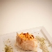 CAPRESE 2.0 - Sfoglia di pane con spuma di burrata e pomodoro su sale rosso delle hawaii e nevischio di basilico e melograno - -