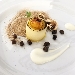 Cilindri di patata ripieni di creme br�l� di parmigiano, uovo di quaglia caramellato, champignon disidratati, farina di porcini e champignon, brunoise di tartufo nero glassato - -