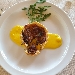 Crostatina di pasta bris�e con carciofi su letto di fonduta di crema al pecorino - -