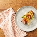 Filetto di maiale con formaggio Stelvio, speck Alto Adige IGP e mele Alto Adige IGP - Autore: Meraner and Hauser - -