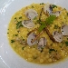 Fregola sarda allo zafferano con arselle, zucchine e menta - -