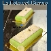La Foto del Giorno del 22 Settembre 2021 - Mary sol, pan di Spagna al cacao e croccantino di pistacchi, bavarese al cioccolato bianco, cremoso al pistacchio e glassa lucida al pistacchio - -