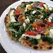 Luisella nel ruoto (Scarola riccia del Vesuvio, olive itrane, capperi di Sicilia, alici di Cetara, pomodorino giallo e rosso del Vesuvio, pinoli, provola e olio evo Vesuvio Punzo) - Pizzeria Haccademia di Aniello Falanga (Terzigno - NA) - -