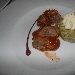 Nodino di annutolo cotto a bassa temperatura con salsa di mirtillo e flan di friarielli con fonduta di provola di Agerola - -