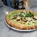 Pizza con broccoli, fior di latte, peperone crusco e formaggio mandarone
 - -