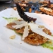 Ravioli all'Aglianico del Vulture in farcia di Baccal�, Mollica croccante di Pane di Matera DOP, Peperone crusco IGP di Senise e Lamelle di Cacioricotta Lucano su Dressing al Basilico
 - -