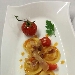 Ravioli di pasta fresca  con ripieno all'amatriciana, pomodorini appassiti e pesto di prezzemolo al pecorino
 - -