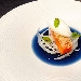 Salmone in guazzetto di cavolo cappuccio con sorbetto alla citronette - -