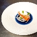 Salmone in guazzetto di cavolo cappuccio con sorbetto alla citronette - -