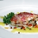 Triglia di scoglio alle verdure con salsa ai pomodorini gialli del piennolo e guanciale di maiale nero casertano - -
