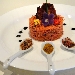 Risottino alle arance con curry, castagne e tuill� di bacon croccante - -