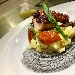 -polpo scottato , patate al limone, puntarelle e piennolo confit  - -