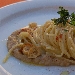 Inserimento Nuova Ricetta - Spaghetti risottati aglio e olio evo Principe del Vulture DOP su crema di pane di Matera, polvere di peperone secco IGP di Senise e prezzemolo fritto.
