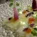 Carpaccio di baccal� con petali di cipolla, smetana, uova di salmone fresche, salsa di soia, gelatina di alloro e germogli di crescione - -