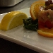 Tartare di palamita e zucchine marinate all'arancia con pomodori datterini essiccati, insalatina di salicornia e datterini freschi - -