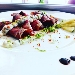 carpaccio di irlandese con maionese ai capperi ,bottarga al profmo di lime  - -