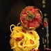 Spaghetti trafilati al bronzo, aglio di Cervia, mosto d'olio e peperoncino ligure con dadolata di tonno Marsala - -
