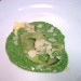 Tortello di ricotta e spinaci su pesto di rucola selvatica e lamelle di mandorle - -