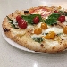 Pizza ai 4 pomodori - -