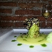 Roll� di branzino con gamberi rossi e pistacchi in foglia di lattughina su vellutata di patate al limone e capperetti di Pantelleria con bavarese di melanzane - -