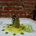 Roll� di branzino con gamberi rossi e pistacchi in foglia di lattughina su vellutata di patate al limone e capperetti di Pantelleria con bavarese di melanzane - -
