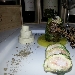 Roll� di branzino con gamberi rossi e pistacchi in foglia di lattughina su vellutata di patate al limone e capperetti di Pantelleria con bavarese di melanzane - -
