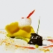 Ravioli ripieni di scorfano su crema di cime di rapa, alga wakame e schiuma di birra - -