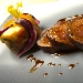 Filetto di maialino di Cesar� lardellato in segreto con caponatina e sale in fiocchi dello Stagnone - -