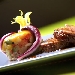 Filetto di maialino di Cesar� lardellato in segreto con caponatina e sale in fiocchi dello Stagnone - -