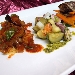 Cous cous con melazane in salsa di pomodorini con capperi e ricci di mare. Zucchinette saltate con polpo, cozze e totani con leggera miscela di mentuccia e anacardi semi salati. Involtini di radicchio con farcia di sarde e polpa di pesca su julienne di ortaggi croccanti al timo limonato - -