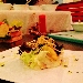 LA TALPA
Tartare di rape rosse al timo, crema di topinambur e noci di Sorrento, Insalatina lollo e scarola riccia al battuto di olive nere infornate, colatura di alici e scorza d'arancia. Chips di vitellotte, patate americane e patate rosse, fili di porro fritti.  - L'intenzione era quella di far assaporare i sapori della terra sorrentina in autunno. i sapori terrosi e le sorprese dei tuberi. Il sapore delle erbette frammiste a foglie secche, le chips, con i sentori delle olive cadute, delle arance e la sapidit� che la terra di mare possiede