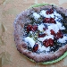 Pizza Innarone (Impasto con grano saraceno, pesto di basilico fatto in casa, fiordilatte, pomodoro essiccato e olio extravergine d'oliva) - -