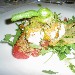 Fiore di zucca con ricotta di bufala aromatizzata alla menta con pomodoro concass�, insalatina di rucola e velo di pane croccante - Fotografia di Luigi Farina
