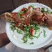 Il tronchetto (ripieno di caciacavallo, ricotta, svizzero e provola, all'uscita rucola selvatica, dattarino rosso, prosciutto crudo, scaglie di formaggio, basilico e olio evo) - -