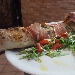 Il tronchetto (ripieno di caciacavallo, ricotta, svizzero e provola, all'uscita rucola selvatica, dattarino rosso, prosciutto crudo, scaglie di formaggio, basilico e olio evo) - -