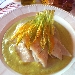 Testaroli mantecati al pecorino su crema di zucchine con fiore di zucca croccante - -