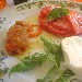 Mozzarella, pomodoro e peperone imbottito. - -