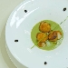 Capesante in crosta aromatizzate su vellutata di porri e piselli - -