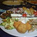 Antipasto sfizioso (mozzarella di aversa, fiore di zucca ripieno, fritture all'italiana, melanzane e zucchine arrostite, insalata di polpo, fragaglie di triglie fritte) - Ristorante Pizzeria Bernadette di Napoli - -