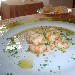Gamberoni saltati al cognac preparati dallo Chef Carmen Mazzola del Ristorante Villa Oasi c/o Oasi Olimpia Relais di Sant'Agata sui due Golfi - Massa Lubrense (NA) - -