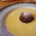 Tortino al cioccolato su crema di vaniglia preparato dallo Chef Carmen Mazzola del Ristorante Villa Oasi c/o Oasi Olimpia Relais di Sant'Agata sui due Golfi - Massa Lubrense (NA) - -